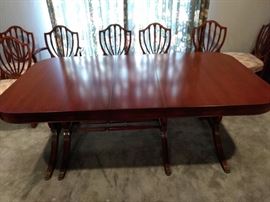 1940's Duncan Phyfe Dining Table with Harp / Lyre Legs. Including 6 Chairs and 2 Arm Chairs. This set is in fabulous condition