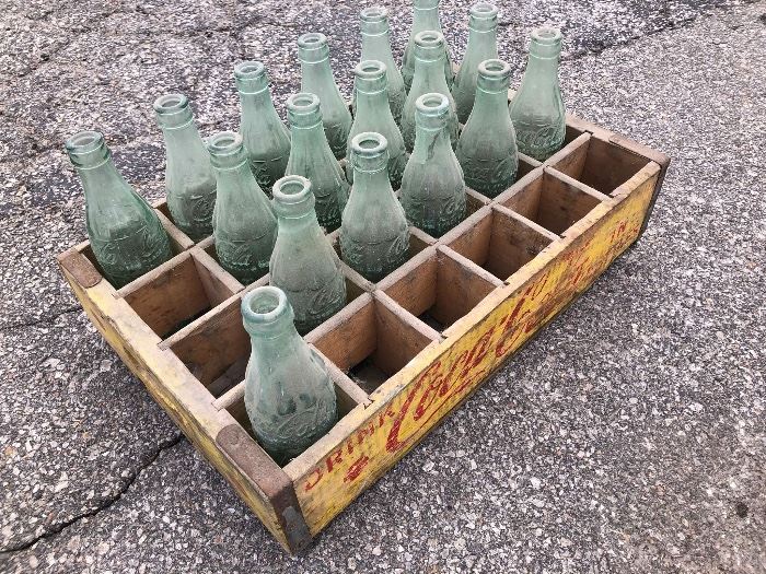 Old Coke crate with glass bottles 