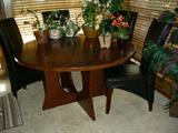 Lazy-susan table, set of chairs.