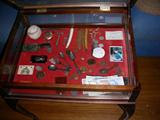 Display table, sterling utensils, etc.