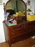 Dresser with mirror and matching chest of drawers.
