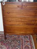 Dresser with mirror and matching chest of drawers.