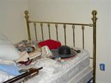 Brass bed.
