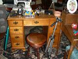Kneehole desk, vintage piano stool, tripods for cameras, sewing machine