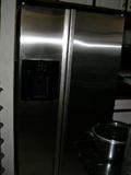 Stainless steel side-by-side refrigerator.