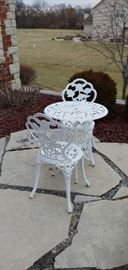 white table with two matching chairs