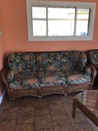 Nice rattan/wicker set. Note the cushions have a fish motif!!