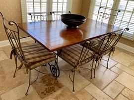 23.  Plank Top Dining Table on Metal Base (40" x 66" x 30")                                                                                                                        22. Metal Dining Chairs w/ Pads 2 Arm Chairs (18" x 27" x 40") 4 Side Chairs (20" x 21" x 34")