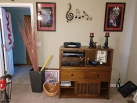 TV Room: Large Vase w/Reeds, Bose Stereo, KLH Dvd Player (DVD-8350),  Kendell 44"  2 Drawer + Open Case + Sliding Door Cabinet. (Sold by Crate &  Barrel)