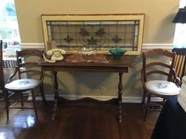 Stain Glass window,  Antique Library Table, 2 Antique Cahirs with needle-point cushions.