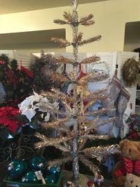 Vintage tinsel tree, this is super cool!  We all love it!!