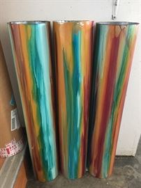 These are large painted metal tubes, not sure what they are but they are very cool 