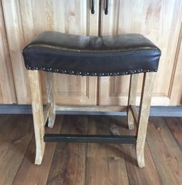 One of four leather seat bar stools - 23"