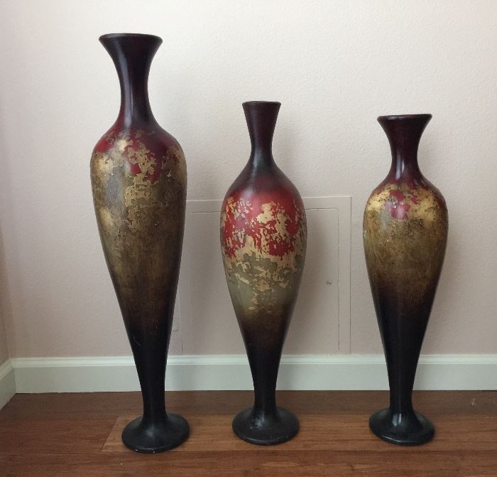Set of three pottery vases