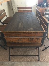 Rustic table on custom metal frame,  8' x 4' with six benches