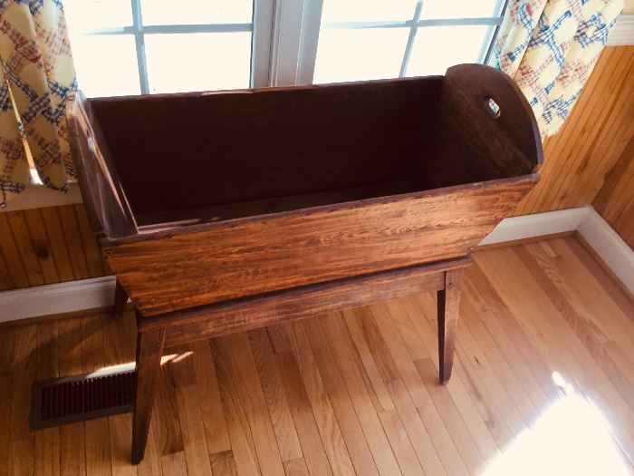 Showing the Primitive Farmhouse Wood Dough Box on Tapered Risers with Lid off which highlights the Patina.  Late 1800’s Coffin Shape features Open Hand cut slits for ease of relocating this rare find to any room of the home.