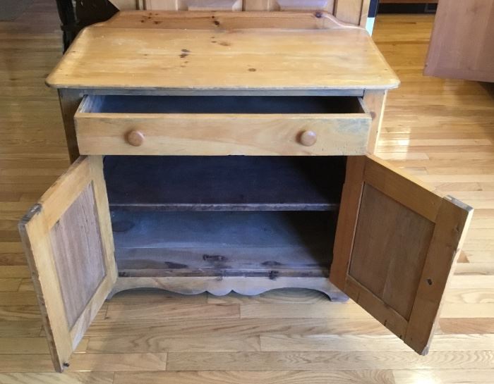 Late 1800's Scrubbed Pine Washstand with center drawer and cabinet with shelf. Very nice find.