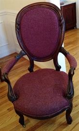 Beautiful Victorian Burgundy upholstered Parlor Chair with original casters for ease of moving from one room to another room. Great condition.