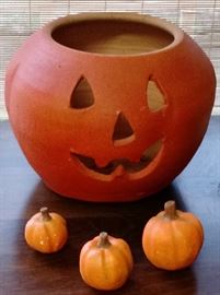 Large Pottery Jack O Lantern and smaller pumpkins