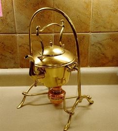 Vintage Brass Tetley Teapot with Brass Warming Stand. This is a very unique and would look great on the serving table in any home.