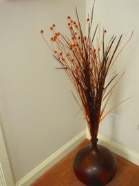 Pottery floor vase with natural grasses and dry flowers