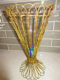 Tall iron and glass vase