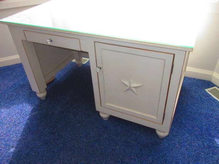 Contemporary desk with star detail on door