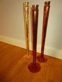 Group of large glass candlesticks