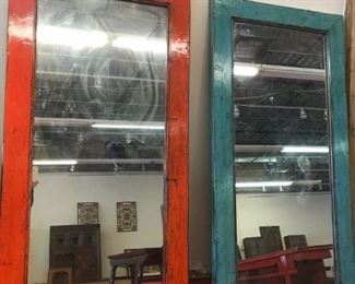 Large sized mirror with solid wood frame.