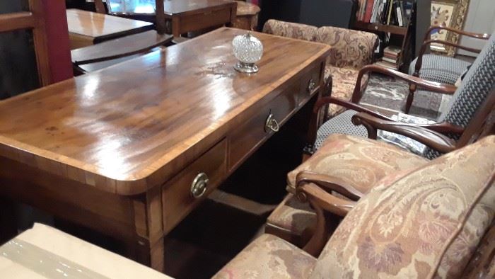 Desk with unusual escheuons. Beautiful wood. Antique.