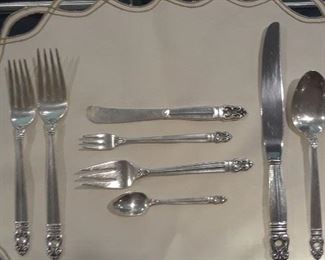 A  view of the various pieces available. 40 knives, forks, and spoons. 40 iced tea spoons, 35 soup spoons, 36 luncheon knives, 32 luncheon forks, 20 fruit spoons, 32 cocktail forks, 6 serving spoons, 39 individual butter knives, and 12 demi tasse spoons.