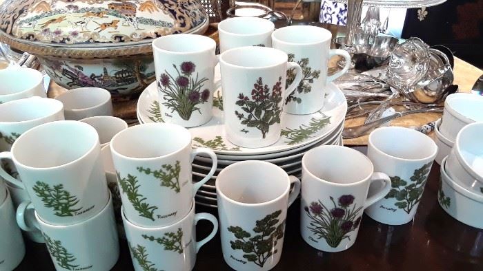 Mugs with various herbs 