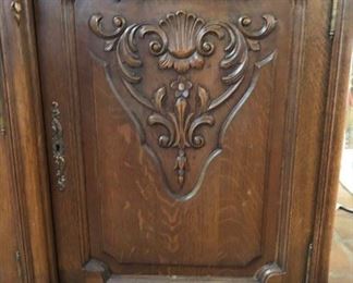 Detail of carving on door of buffet