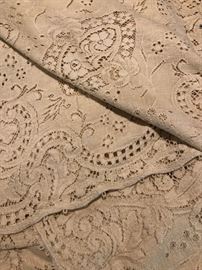 Detail of a machine made lace tablecloth