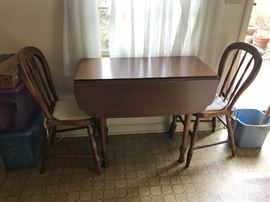 #1	drop side table w sliding legs and 2 chairs 16-34x34x29	 $120.00 
