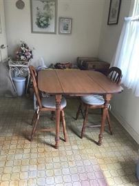 #1	drop side table w sliding legs and 2 chairs 16-34x34x29	 $120.00 
