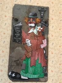 #5	Laiche Z 72 clown on slate on Bourbon St painting  "1001 ways to make million" 8x16	 $60.00 

