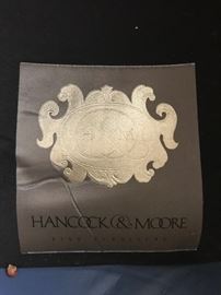 #35	Handcock &Moore blue leather chair that reclines and ottoman nail head front 	 $400.00 
