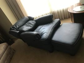 #35	Handcock &Moore blue leather chair that reclines and ottoman nail head front 	 $400.00 

