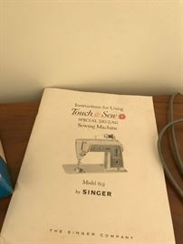 #44	singer touch and sew  sewing machine in mid century cabinet 	 $75.00 
