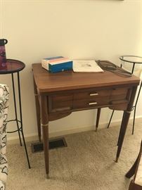 #44	singer touch and sew  sewing machine in mid century cabinet 	 $75.00 
