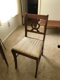 #45	northwestern cabinets odd harp back dining chair 	 $30.00 
