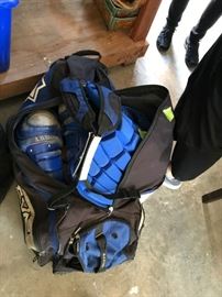 #99	blue bag of catcher equipment 	 $100.00 
