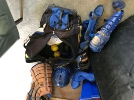 #99	blue bag of catcher equipment 	 $100.00 
