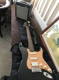 #100	fender Starcaster 15G amp and electric guitar 	 $100.00 
