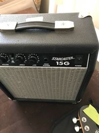 #100	fender Starcaster 15G amp and electric guitar 	 $100.00 
