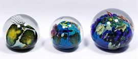Josh Simpson American b.1949 Inhabited Planet Art Glass Paperweight Collection