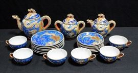 Moriage Dragonware Tea Set With Lithopane Images In The Tea Cups. 6 Tea Cups, 6 Saucers 5.5" Dia., 6 Plates 7" Dia., Tea Pot, Creamer, Sugar Container
