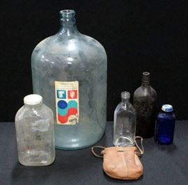 Bottle Collection Including Eads 5-Gallon Water Bottle, Ancient Age Brand Amber Glass Liquor Bottle With Raised Brand Mark, Norwich Pharmaceuticals