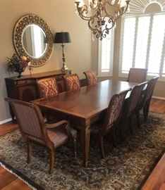 Ethan Allen Dining Table w 6 Adison Side Chairs and 2 Arm Chairs and Sideboard
Round Florentine Mirror Leah Antique Brass Table Lamp (pair)
Agra Brown/Gold Area Rug 8'6" x 11'
Centerpiece